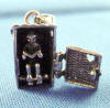 man sitting inside outhouse charm reading - too funny