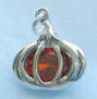 sterling silver pumpkin charm with orange cubic zirconia stone inside