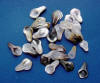 notice all of the colors in these natural moterh of pearl calla lily pendants - white to cream to gold to black