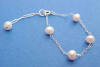 flowergirl pearl station bracelet