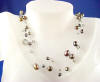 bridesmaid triple-strand illusion necklace in black pearls and black diamond Swarovski(TM) crystals
