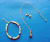 amethyst calla lily necklace with pearl and amethyst bracelet and pearl earrings