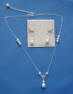 pearl necklace with filigree drop in front with earrings